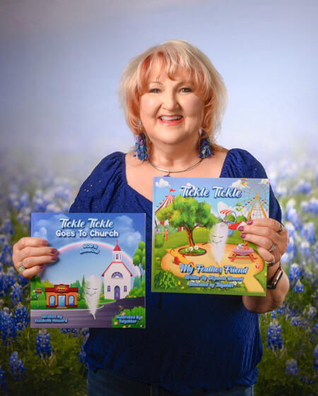 Elizabeth Howard - Christian Children's Author Elizabeth Howard, Christian author, holding two books from her Tickle Tickle children's series that share scripture and faith-filled stories.